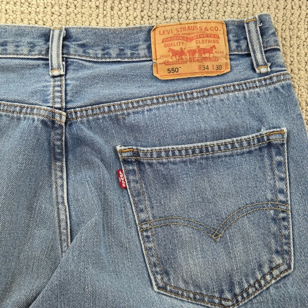 Vintage Levis 550 Relaxed Fit Blue Jeans Light Wash Denim Distressed Mens‎ 34x30